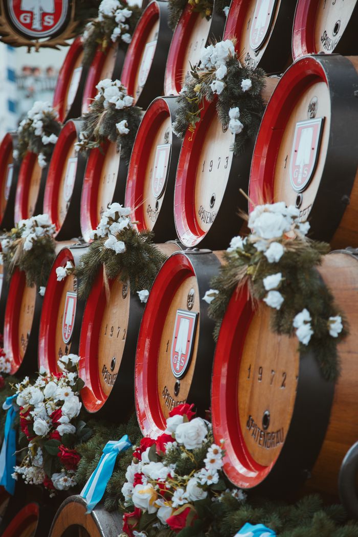 Decorated beer barrels at Oktoberfest in Munich, celebrating Bavarian culture.
